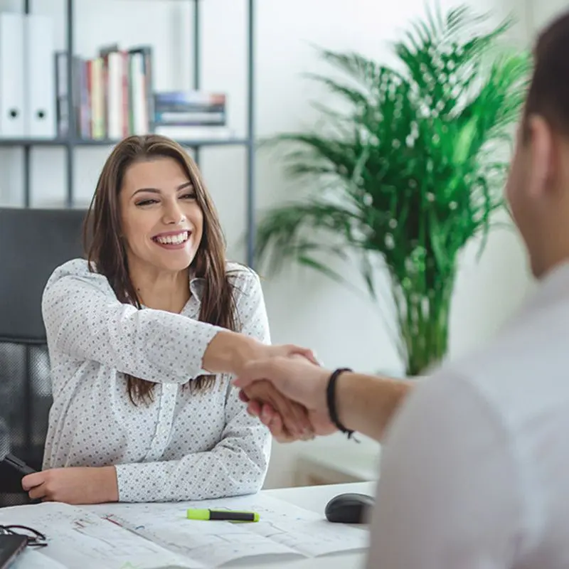 job recruitment agent shaking a prospective candidate's hand